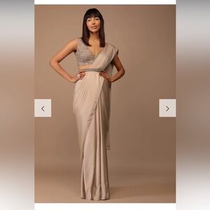 Champagne Satin Saree With Bead Fringes Paired With Heavily Embellished Top